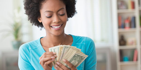 a woman counting money