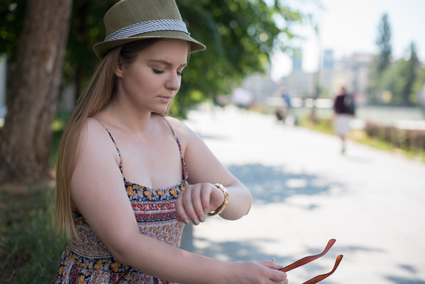 woman looking at her watch